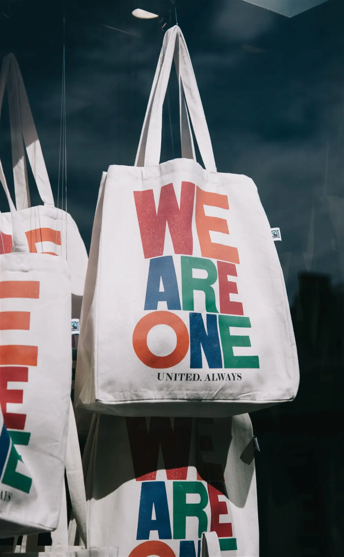 we are one white canvas long handle canvas bag